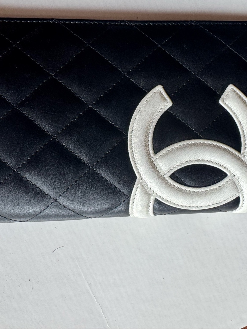 CHANEL Black Quilted Wallet with White Logo Accent